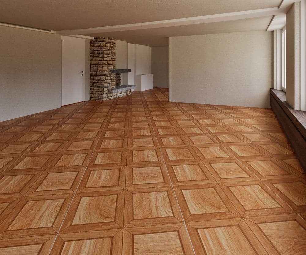 Großer, leerer Raum mit Holzparkett, weiß gestrichenen Wänden und rundem Kamin.