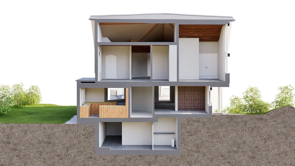 Querschnitt eines modernen Wohnhauses mit drei Etagen, zeigt Innenraumgestaltung und umliegende Landschaft.