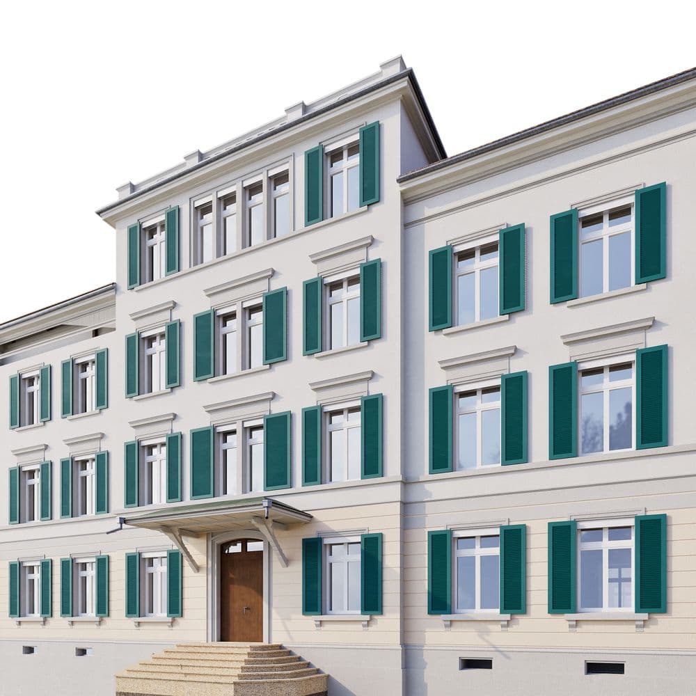 Ein klassisches weißes Gebäude mit grünen Fensterläden und einem Eingangsportal mit Treppe.