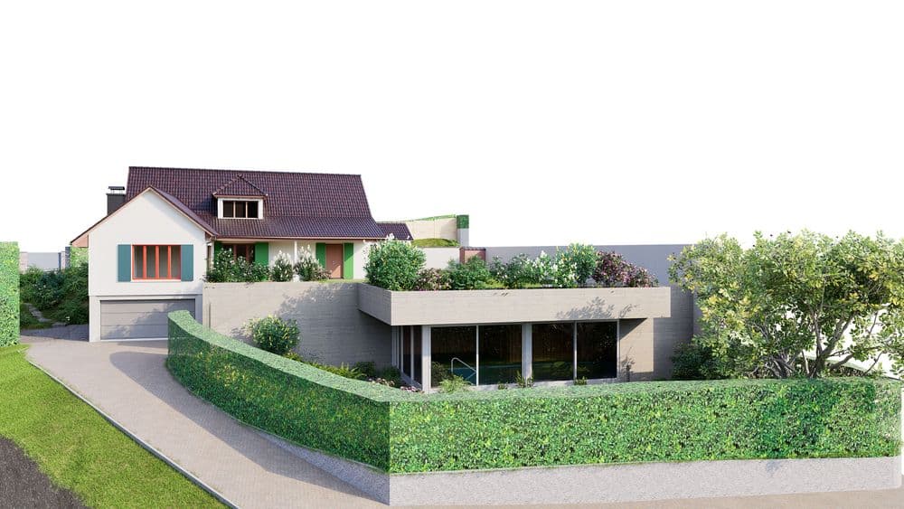 Ein modernes Haus mit zwei Etagen, umgeben von gepflegtem Garten und Hecken, mit gepflasterter Einfahrt.